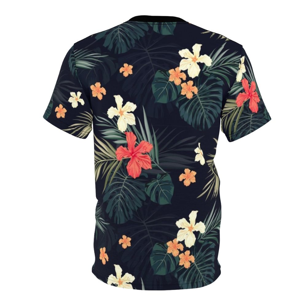 Model wearing a dark t-shirt featuring a tropical floral pattern design. - Back