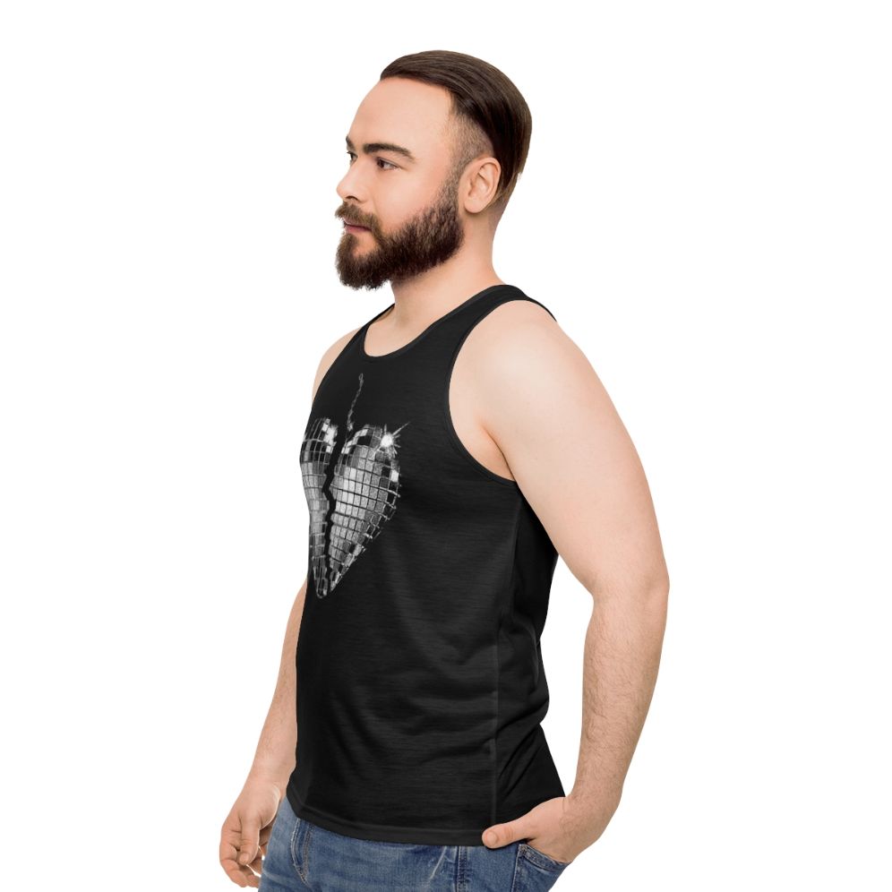 Unisex pop music tank top with "Nothing Breaks Like A Heart 3" design - men side