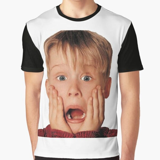 Macaulay Culkin wearing a red shirt in the iconic "Home Alone" movie poster graphic on a t-shirt