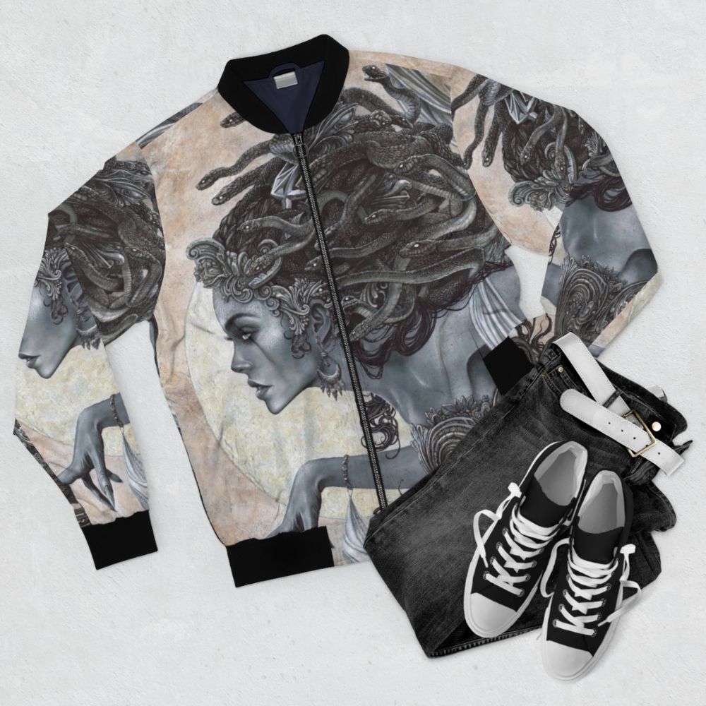 Medusa Inspired Bomber Jacket with Illustrated Cartoon Gorgon Portrait and Snakes for Hair - Flat lay