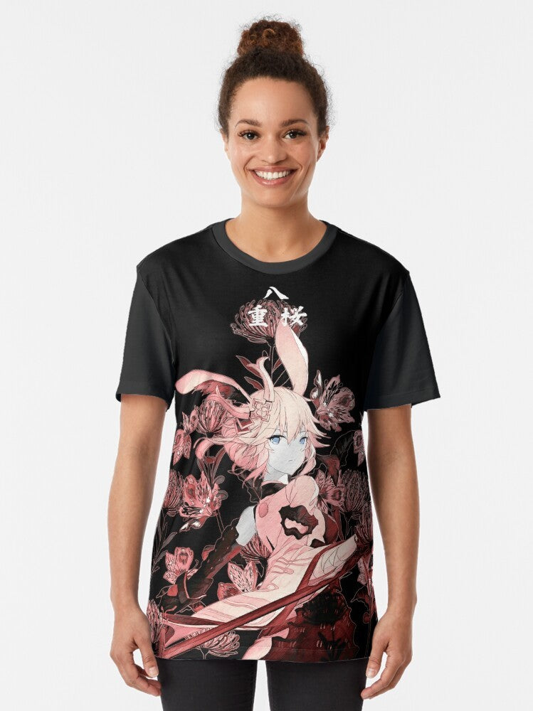 Graphic t-shirt featuring Yae, a samurai character, and the vibrant red higanbana flowers from the Honkai Impact and Genshin Impact games. - Women