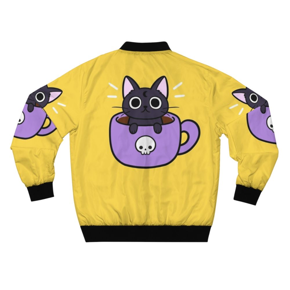 A black and purple bomber jacket with a cute, smiling cat print and coffee/drink elements. - Back