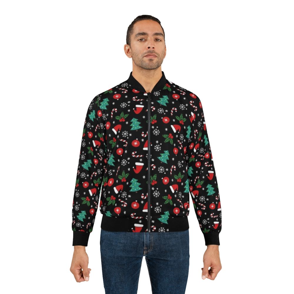 A cozy and stylish Christmas bomber jacket featuring a festive pattern with flowers, music notes, trees, and snowflakes. - Lifestyle