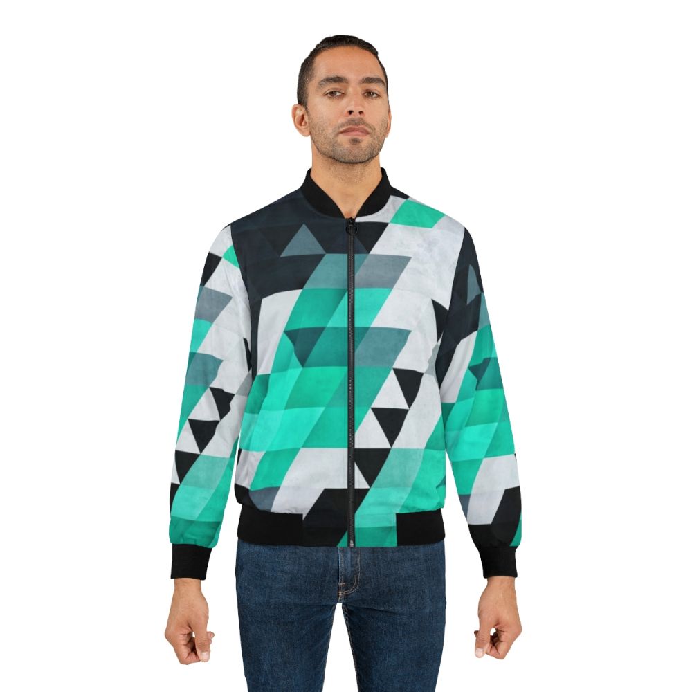 Modern geometric abstract pattern bomber jacket in teal, white, and black - Lifestyle