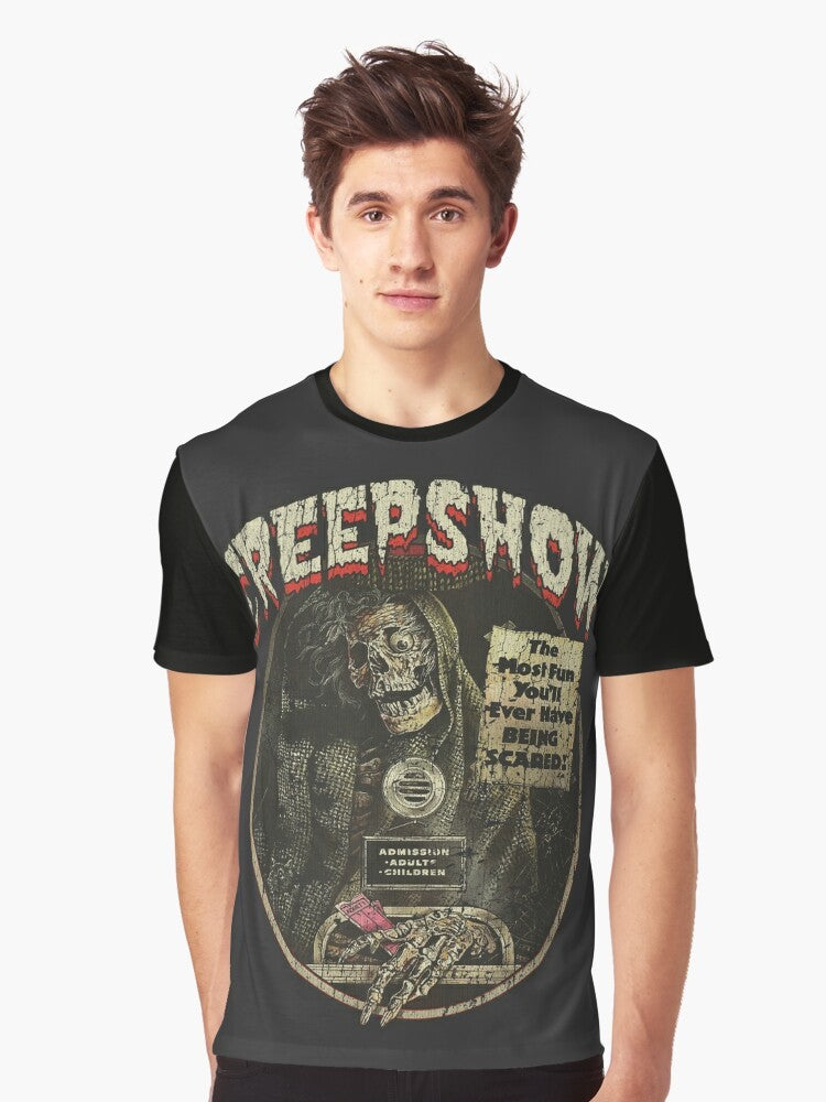 Creepshow 1982 horror movie graphic t-shirt featuring a spooky skeleton and classic 1980s horror design - Men