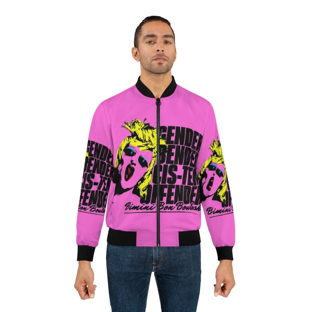 Colorful bomber jacket with "CIS-TEM OFFENDER" pop art design, featuring Bimini Bon Boulash from RuPaul's Drag Race UK - Lifestyle