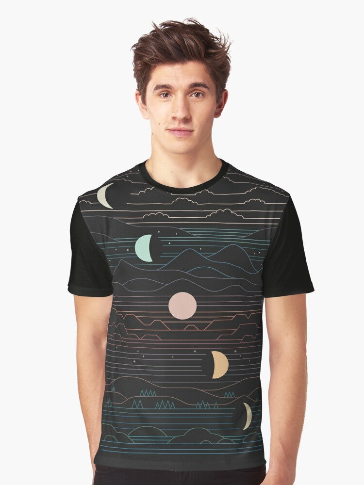 Graphic t-shirt featuring a design of a crescent moon and mountain landscape against a starry night sky - Men