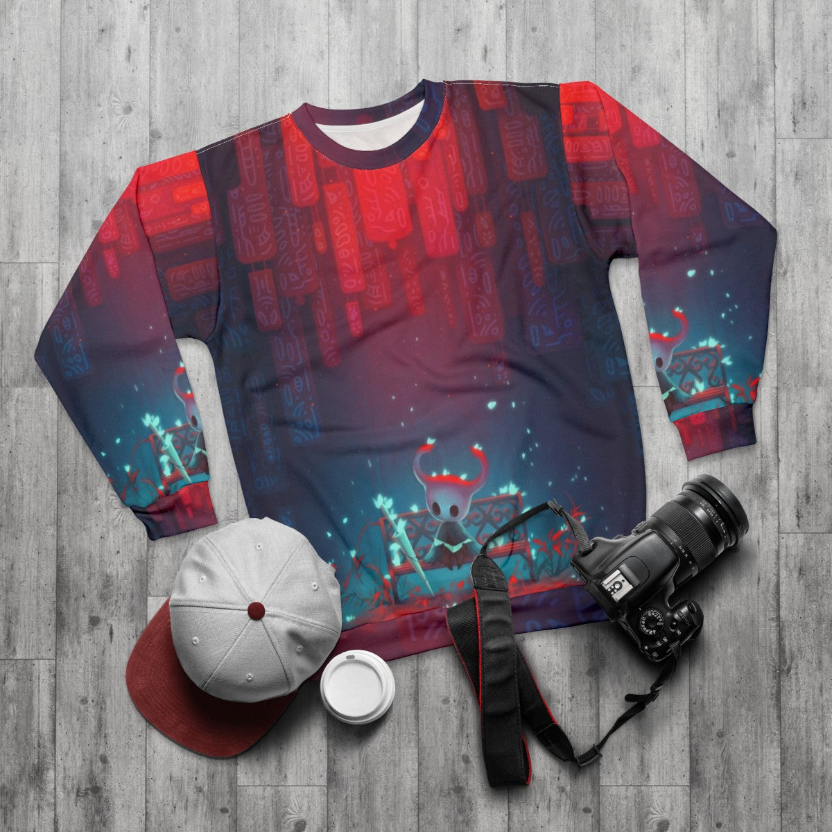 Hollow Knight Sweatshirt featuring the protagonist of the Metroidvania indie game - flat lay