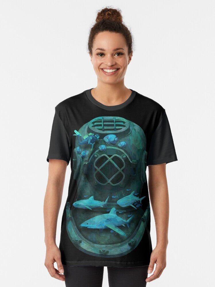 A graphic t-shirt design featuring a whimsical underwater scene with a diver, sharks, and marine life - Women