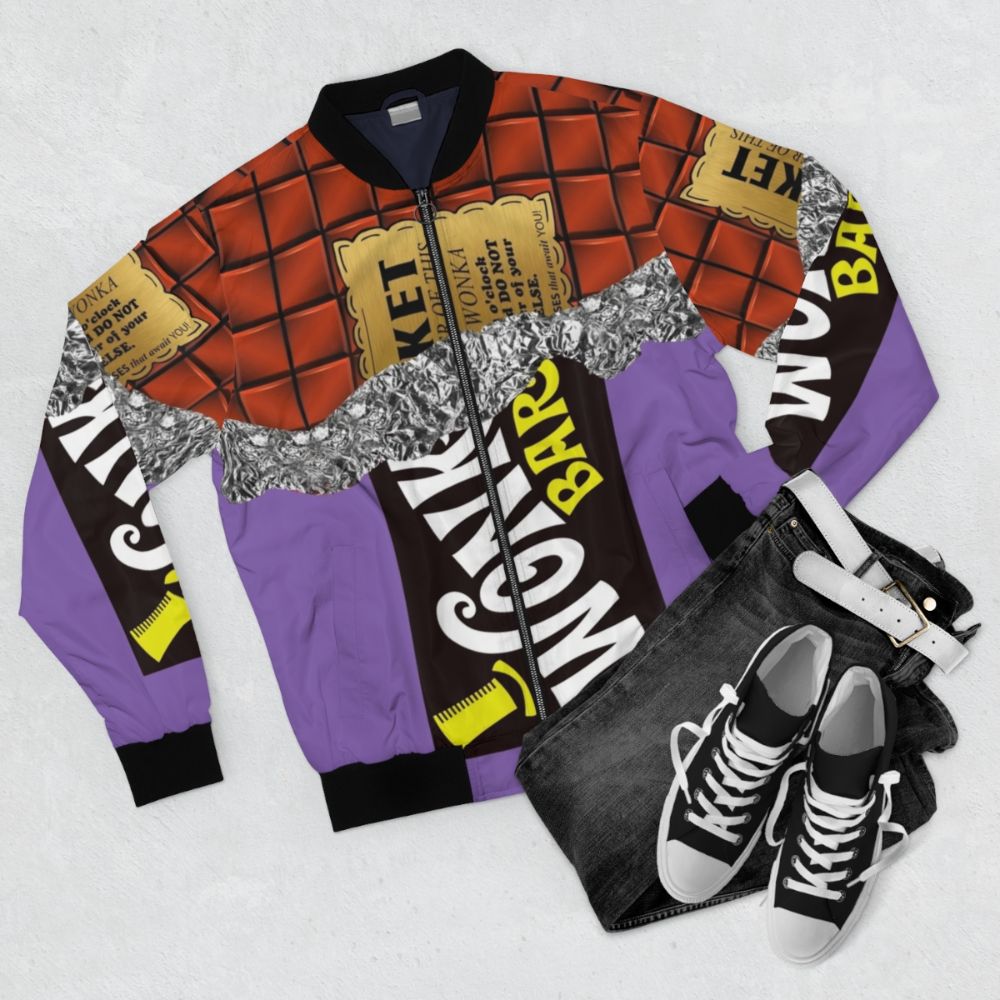 A vintage-inspired chocolate bomber jacket featuring the golden ticket from Willy Wonka's Chocolate Factory - Flat lay