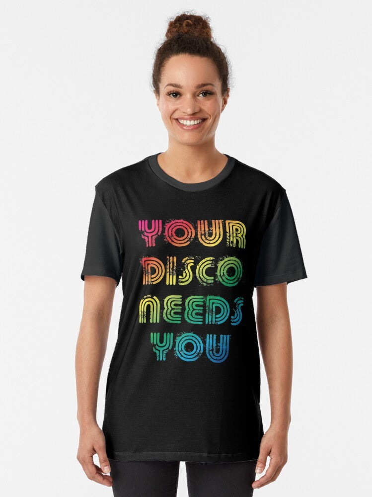 "Your Disco Needs You" Pride Graphic T-Shirt featuring a rainbow flag and Kylie Minogue-inspired design - Women