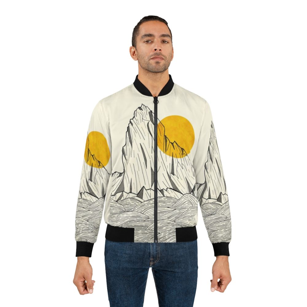 A stylish bomber jacket featuring an abstract design inspired by sea cliffs, mountains, and the natural world. - Lifestyle