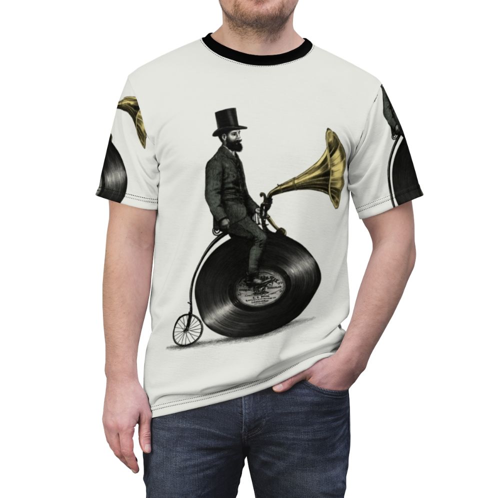 A t-shirt featuring a vintage-inspired, surreal digital illustration of a music-themed character with a top hat, mustache, and penny farthing bicycle. - men front