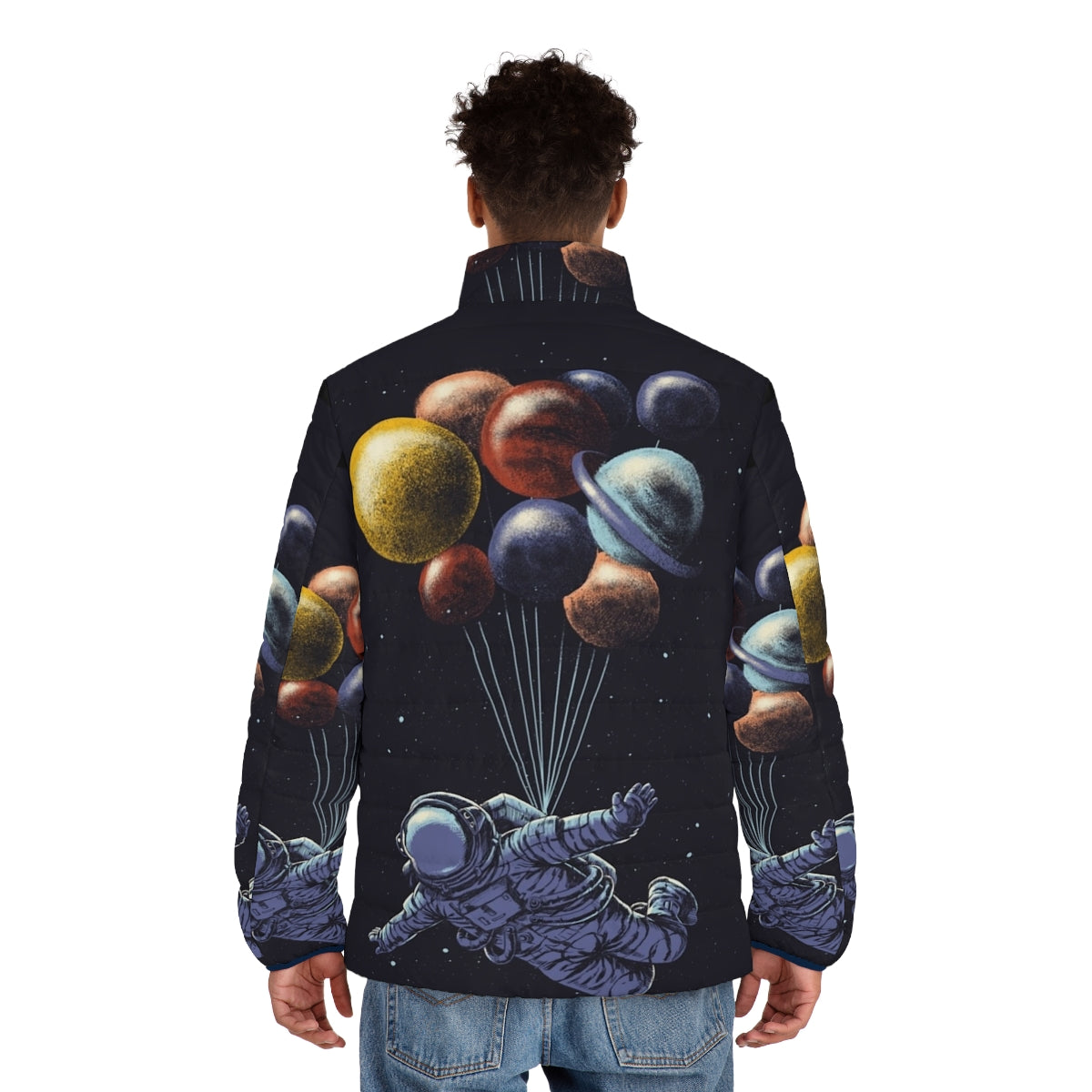 Astronaut in a colorful space travel puffer jacket floating among planets and stars - men back