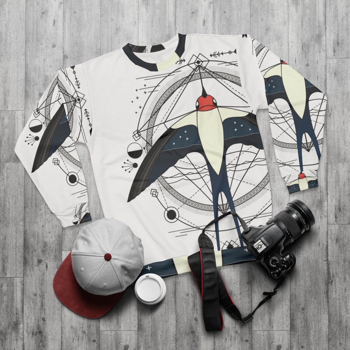 Geometric swallow abstract bird graphic sweatshirt - flat lay