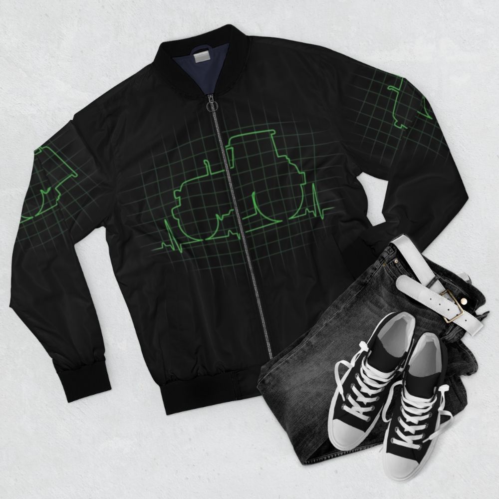 A bomber jacket with a tractor heartbeat design, perfect for farmers and tractor enthusiasts. - Flat lay