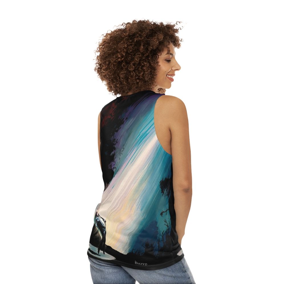 Vibrant sci-fi illustration of a fire in the sky with UFOs on a unisex tank top - women back