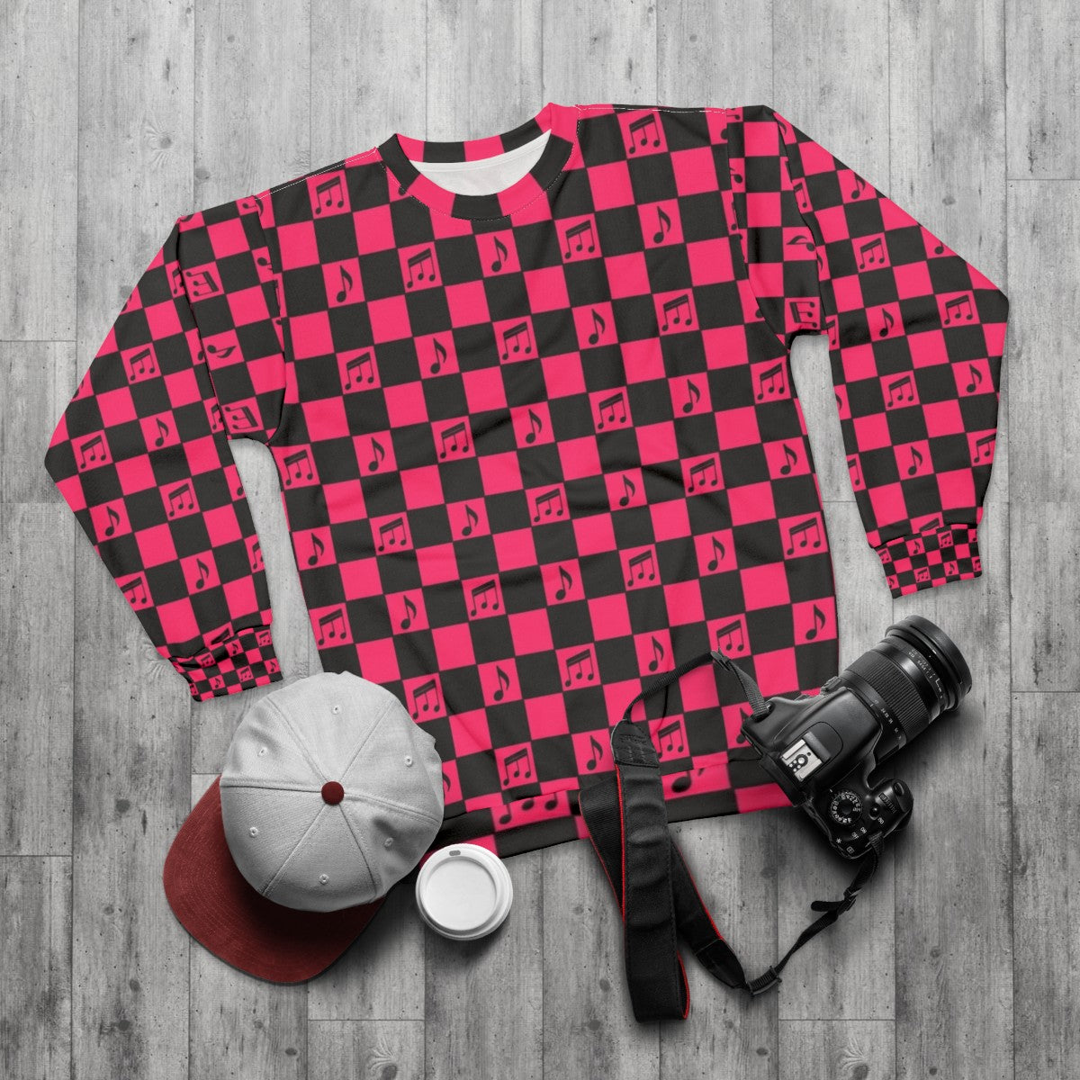 Retro checkerboard music pattern pink sweatshirt - flat lay