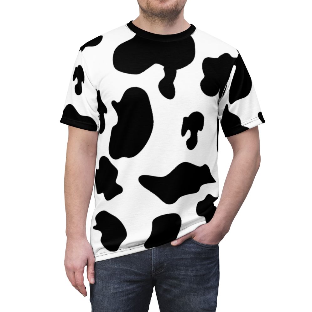 Closeup of a cow pattern animal print t-shirt with a vibrant design - men front