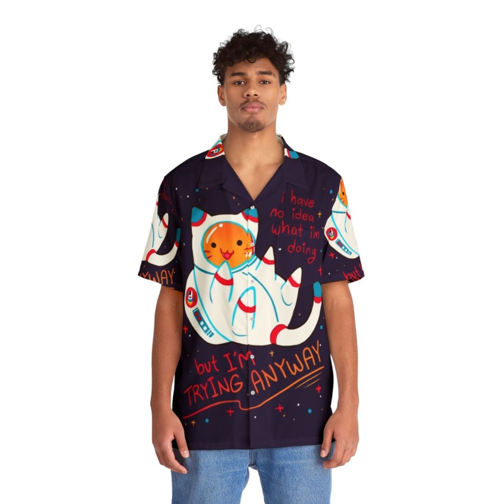 Cat astronaut wearing a Hawaiian-style shirt with positive affirmation - People Front