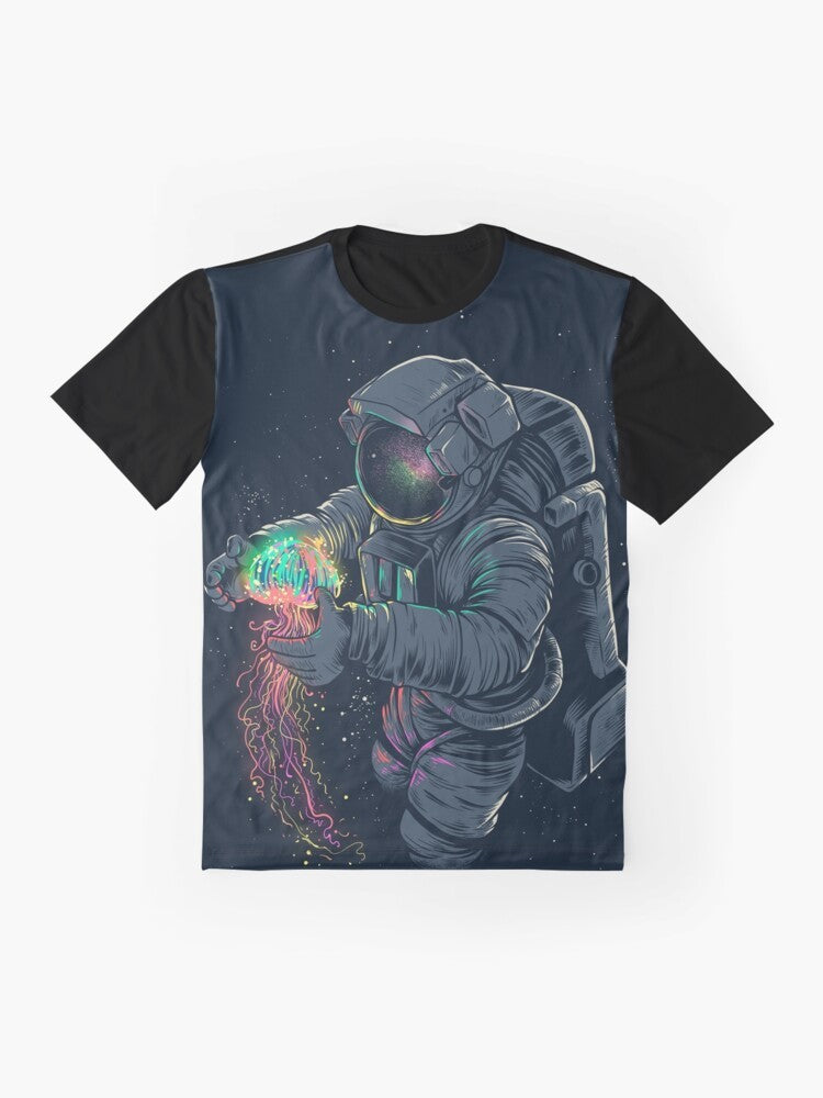 Psychedelic space jellyfish graphic design on a t-shirt featuring an astronaut exploring the cosmos - Flat lay