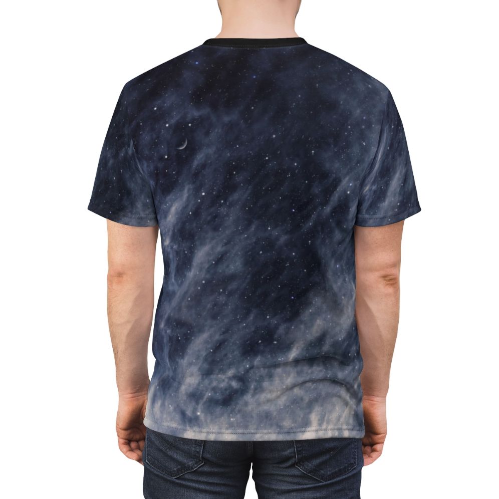 A t-shirt featuring a surreal, moody blue sky with clouds and a crescent moon. - men back