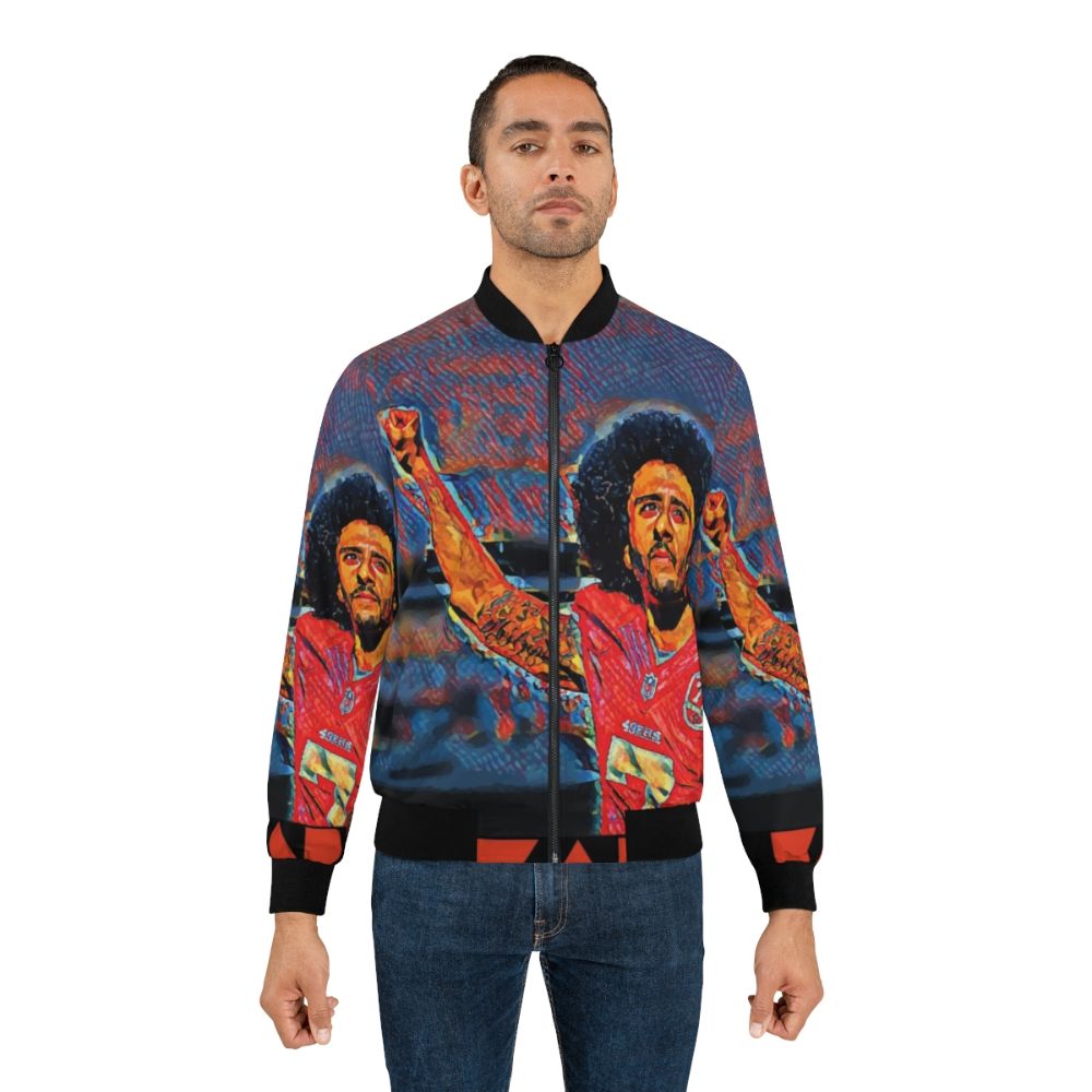 A stylish bomber jacket featuring the image of Colin Kaepernick kneeling during the national anthem - Lifestyle