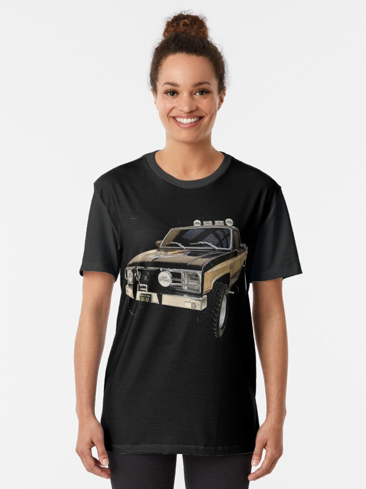 Retro graphic t-shirt featuring the GMC Sierra Grande from the 80s TV series "The Fall Guy" - Women