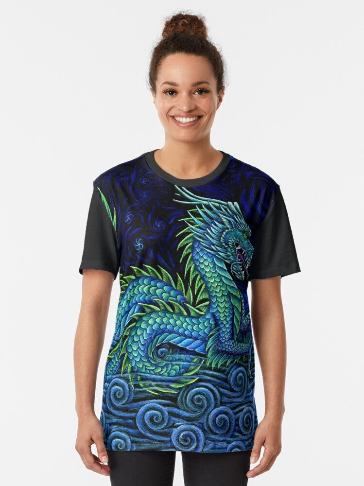 Vibrant graphic t-shirt featuring a majestic Chinese azure dragon against a backdrop of ocean, sky, and mist. - Women