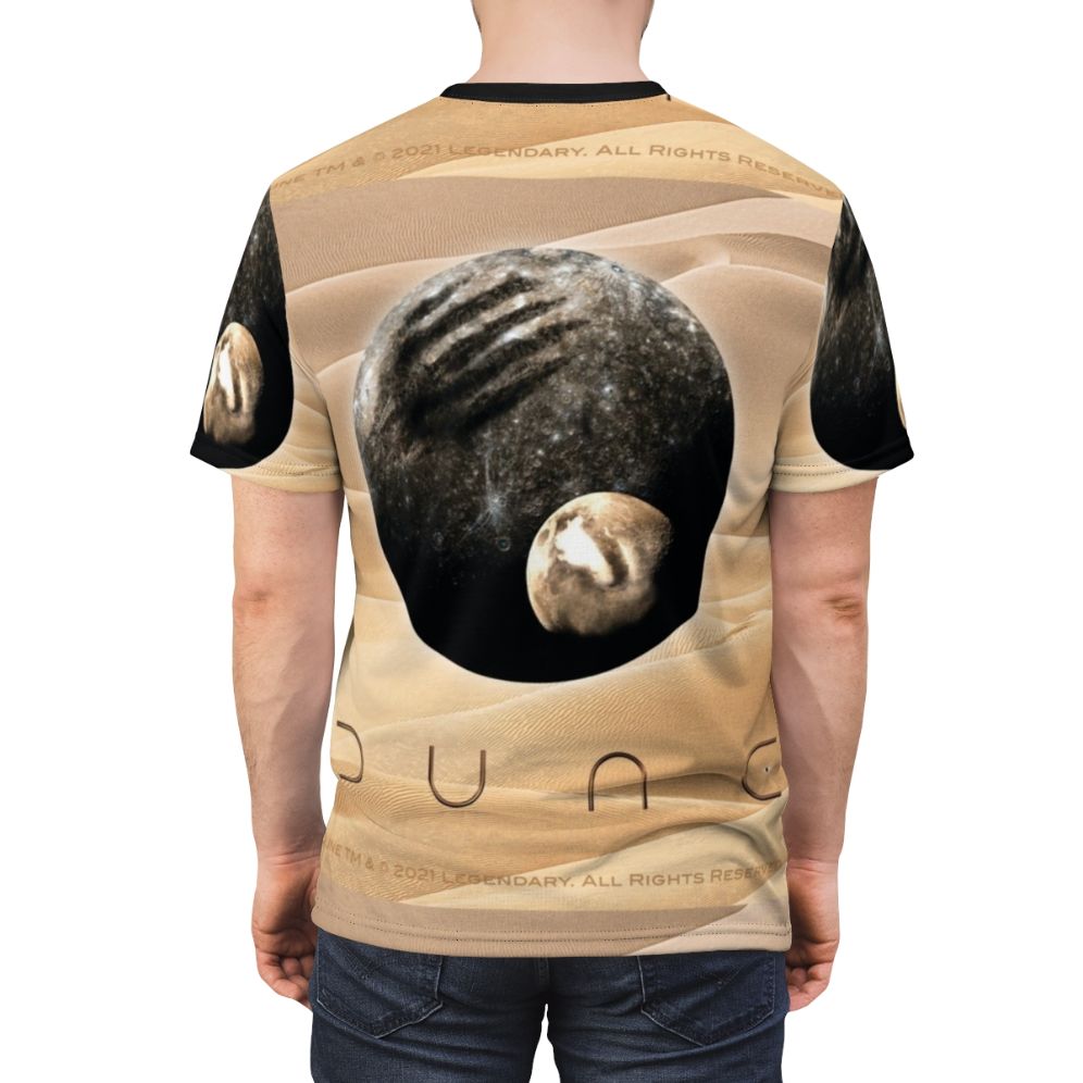 Graphic t-shirt featuring a design inspired by the science fiction film Dune, with imagery of a desert planet and its moons. - men back