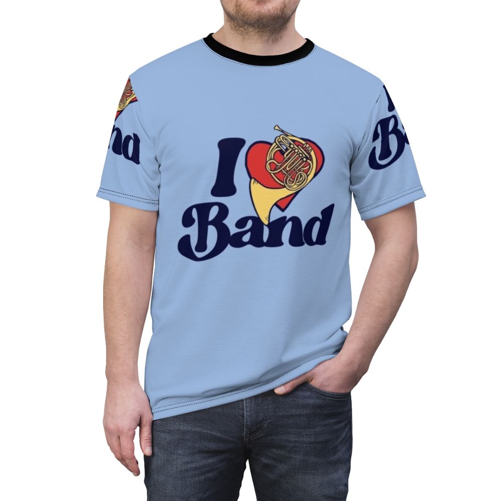 Person wearing a T-shirt with a French horn graphic, representing a love for music and band. - men front