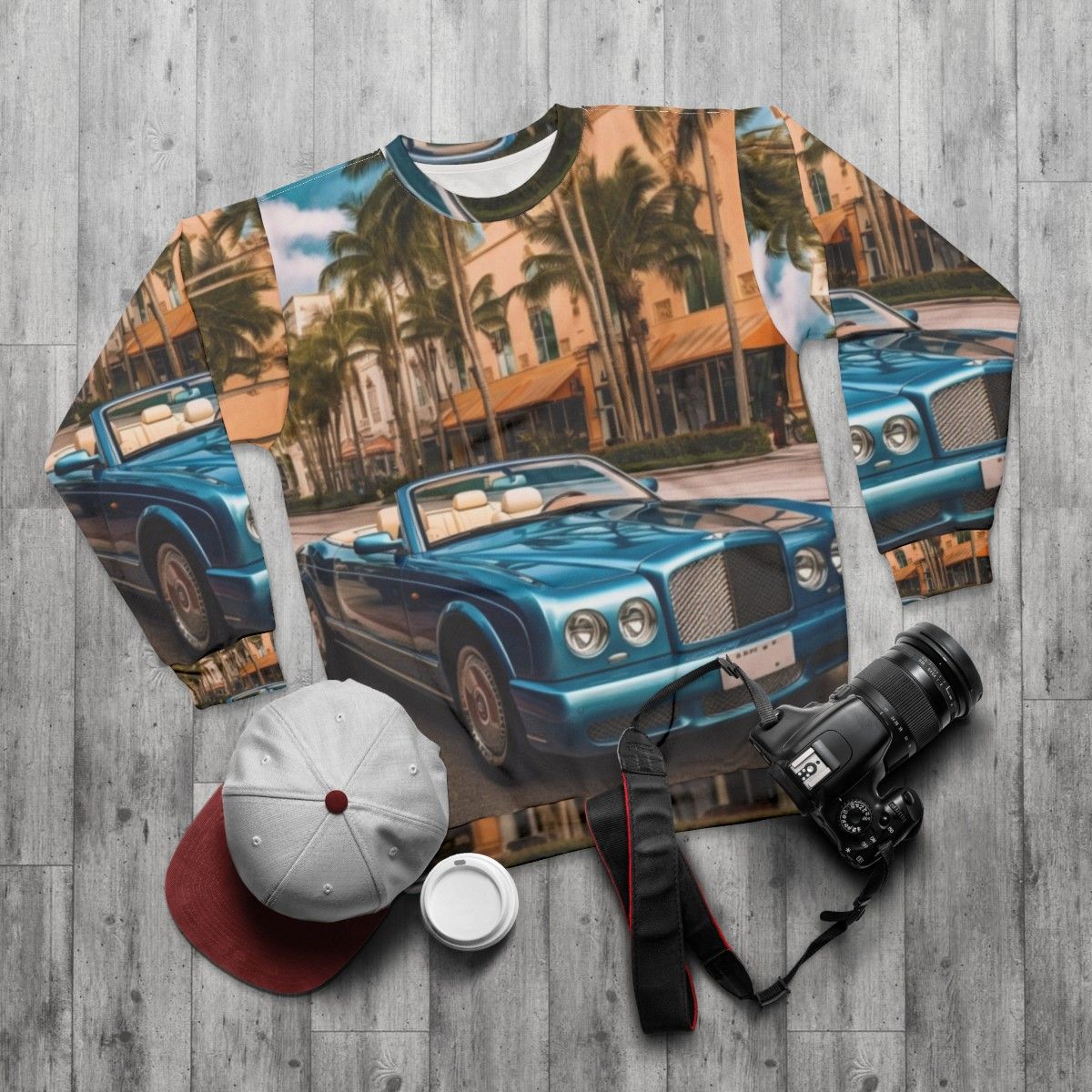 Luxurious Bentley Azure Convertible Sweatshirt with palm trees in the background - flat lay