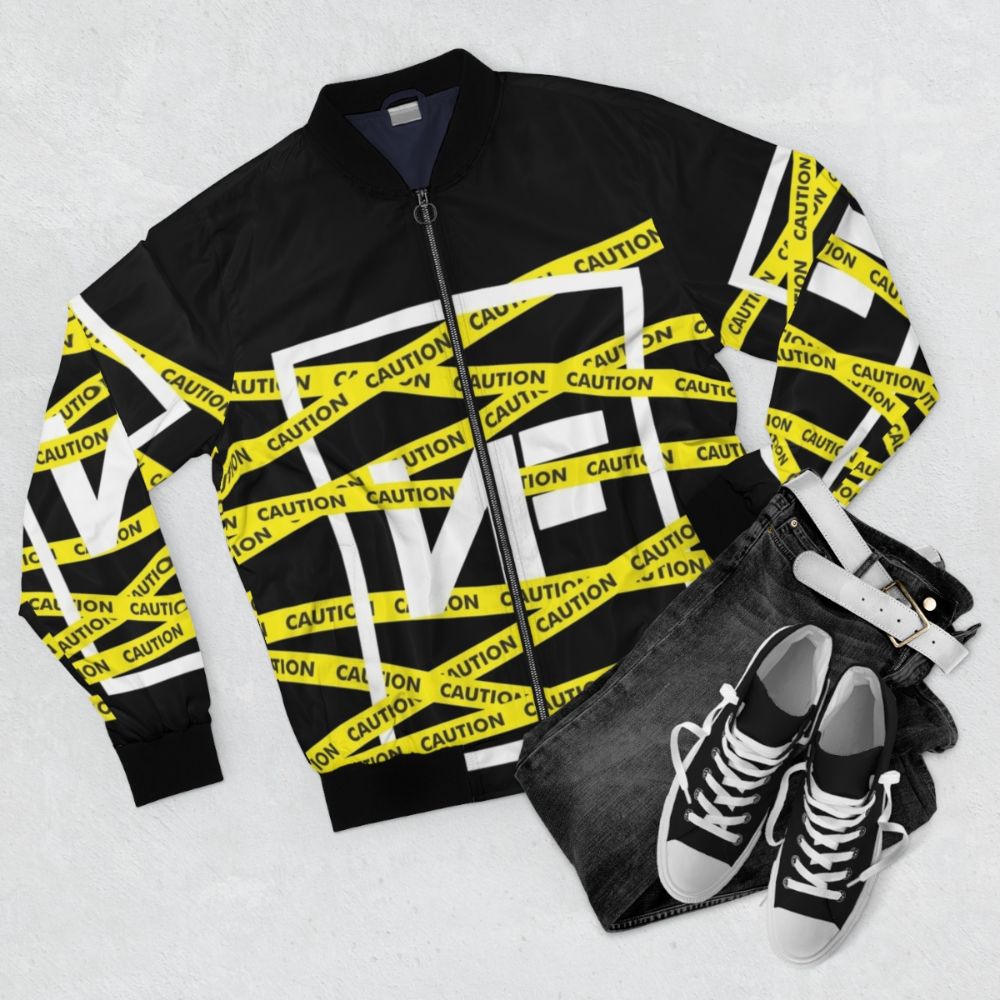 NF CAUTION Bomber Jacket featuring the NF logo and Caution design - Flat lay