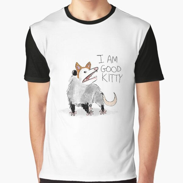 A graphic t-shirt with the text "I AM GOOD KITTY" and an opossum or possum design.