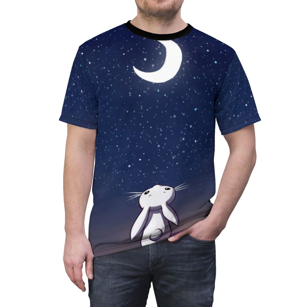 Illustration of a whimsical bunny sitting on a crescent moon against a starry night sky - men front