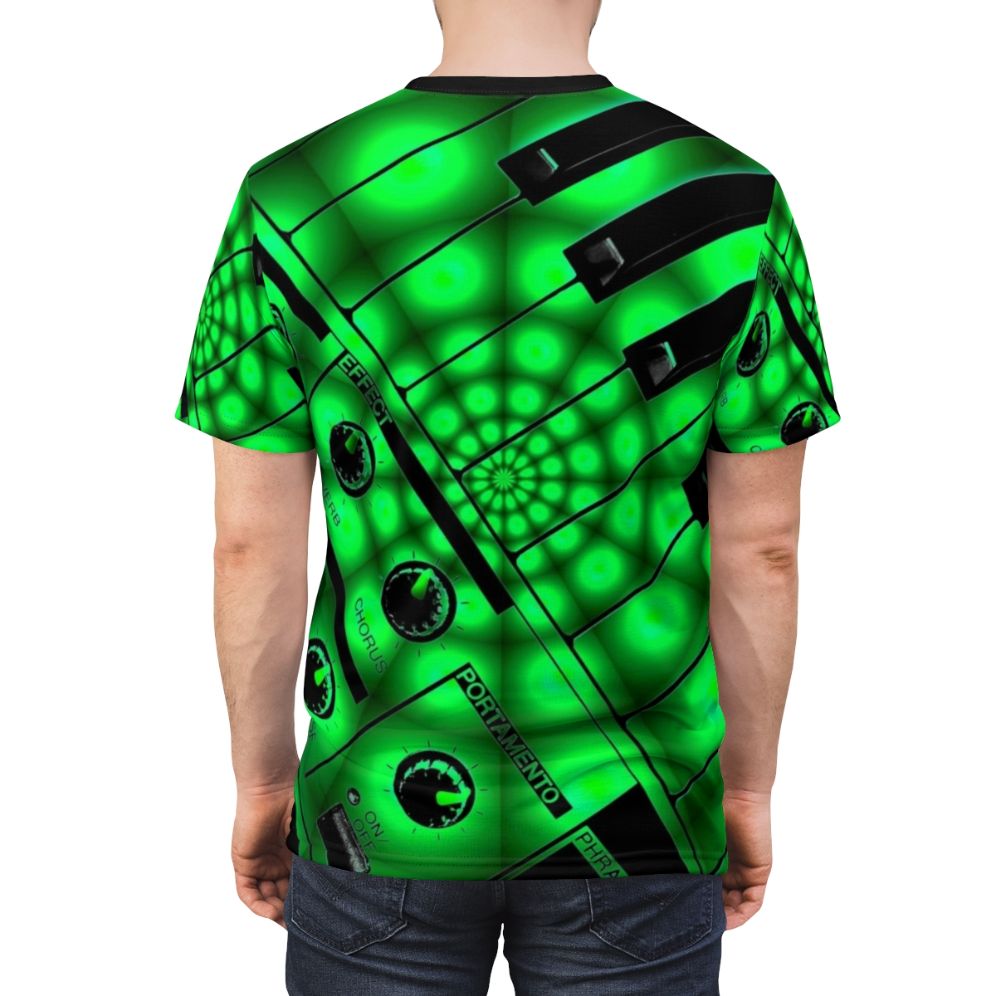 A retro-style t-shirt design featuring a synthesizer keyboard with knobs and filters in a psychedelic, vintage-inspired pattern. - men back