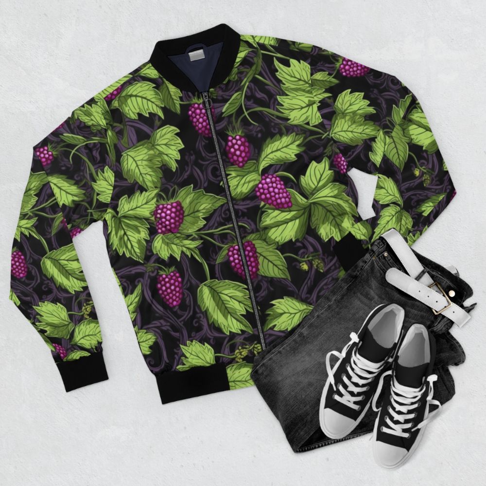 Marionberries botanical bomber jacket with vibrant, unique, and colorful floral design - Flat lay