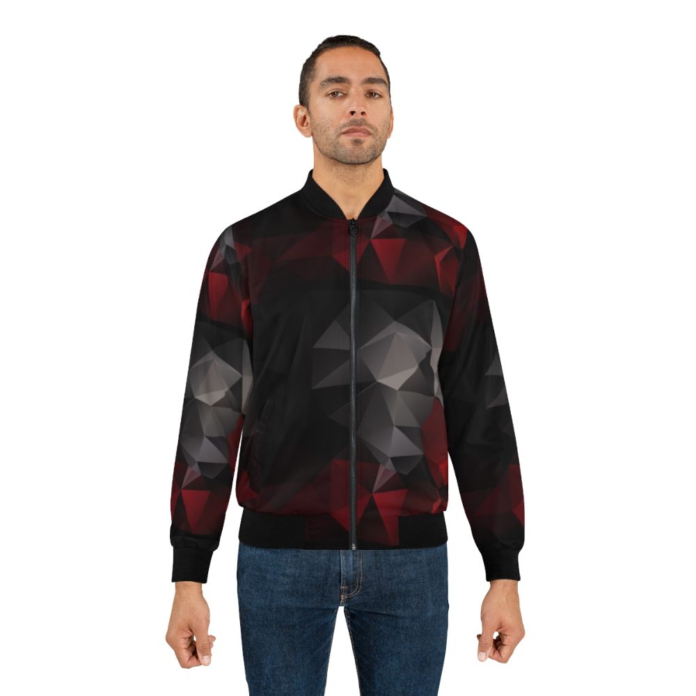 Abstract bomber jacket with a geometric triangles pattern in red and black colors - Lifestyle