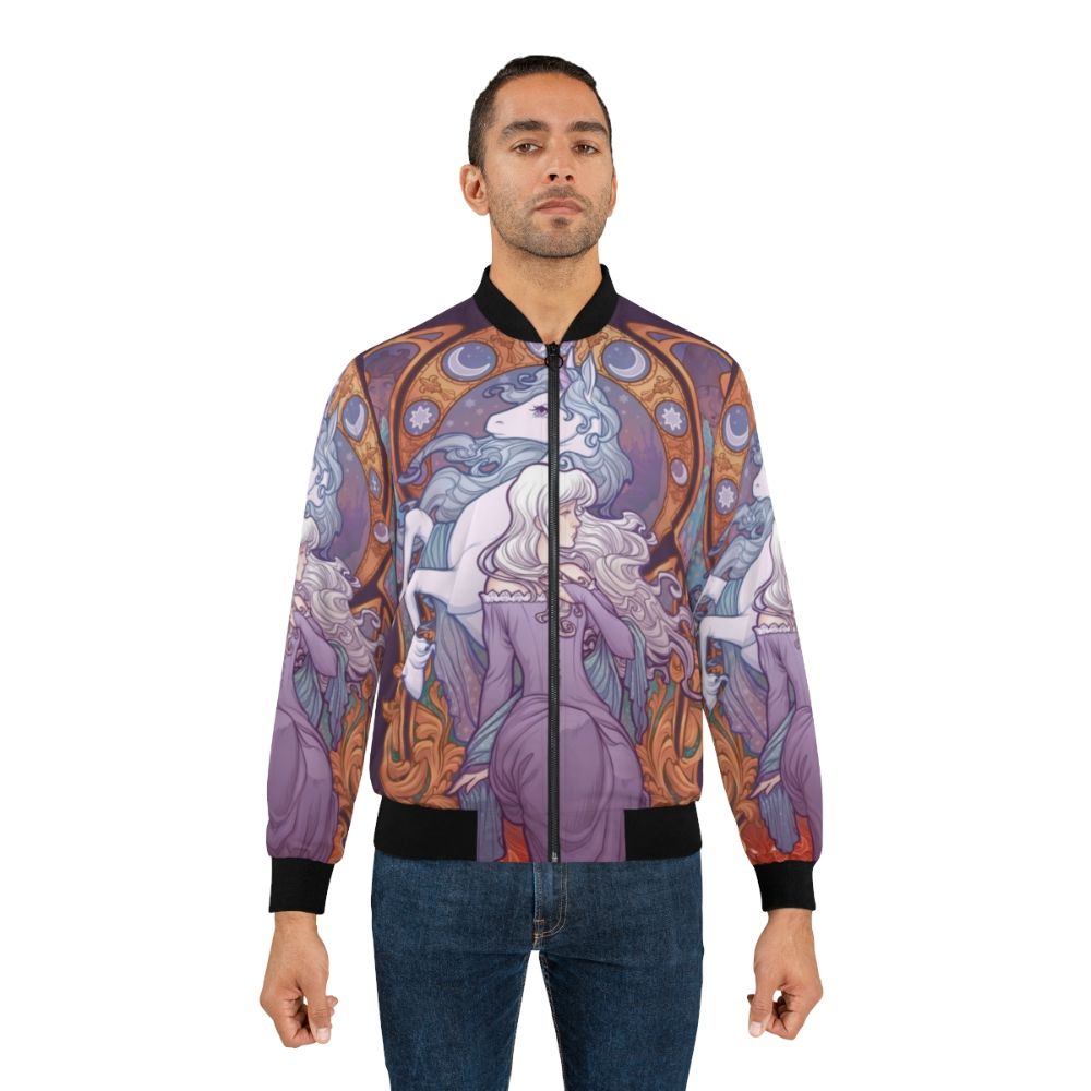 A colorful bomber jacket featuring the character Lady Amalthea from the classic 80s fantasy film "The Last Unicorn". - Lifestyle