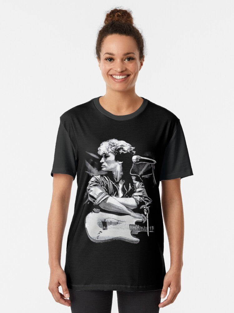 Graphic t-shirt featuring the portrait of Viktor Tsoi, a legendary Russian rock musician, playing guitar - Women