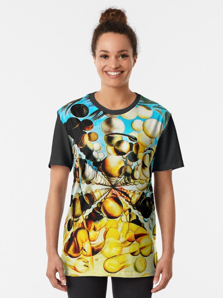 A graphic t-shirt featuring Salvador Dali's surrealist painting "Galatea of the Spheres" - Women