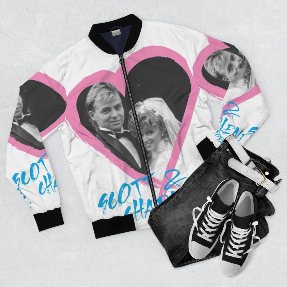 "Scott & Charlene Forever" Bomber Jacket featuring iconic Neighbors TV couple - Flat lay