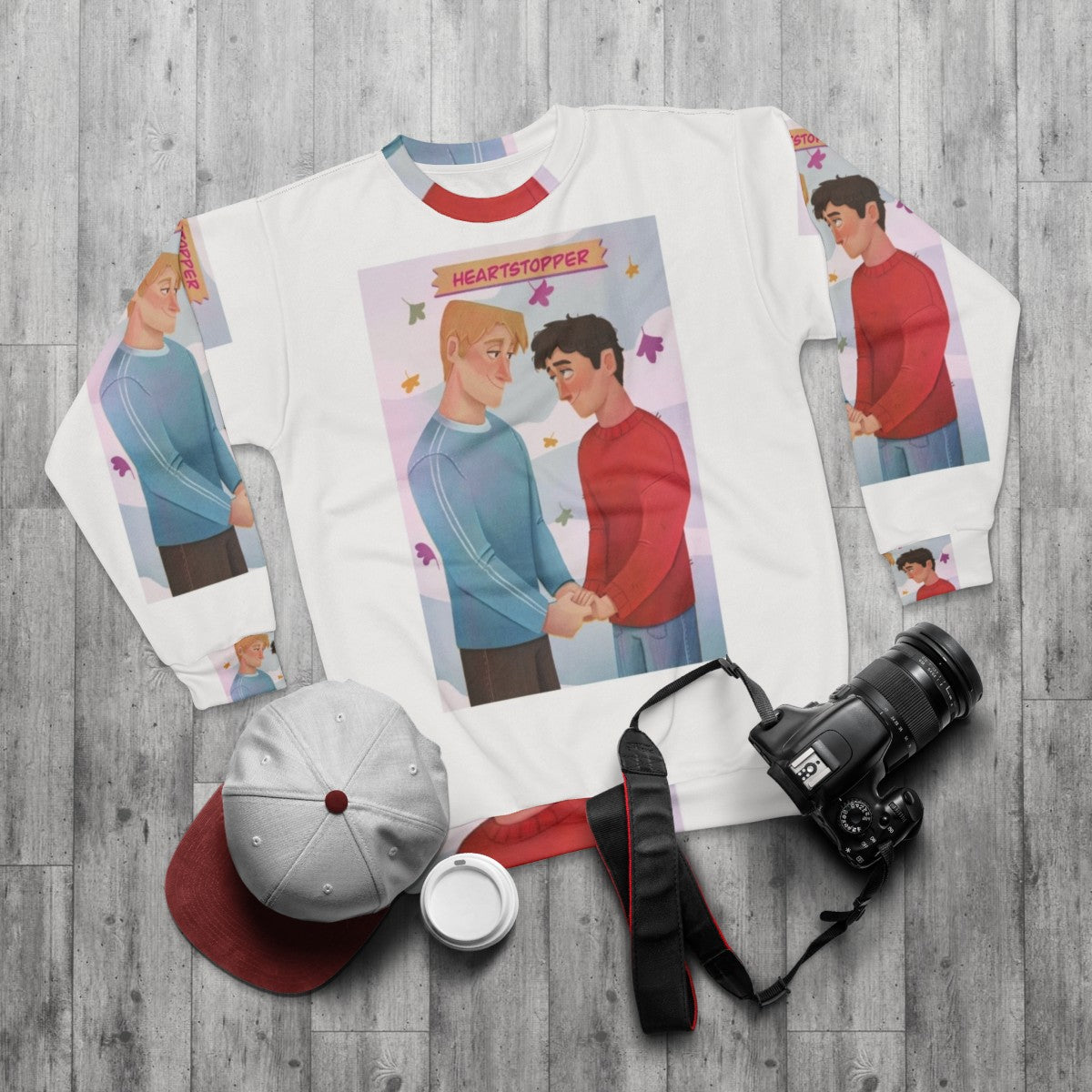 Heartstopper characters Nick Nelson and Charlie Spring illustration on a sweatshirt - flat lay