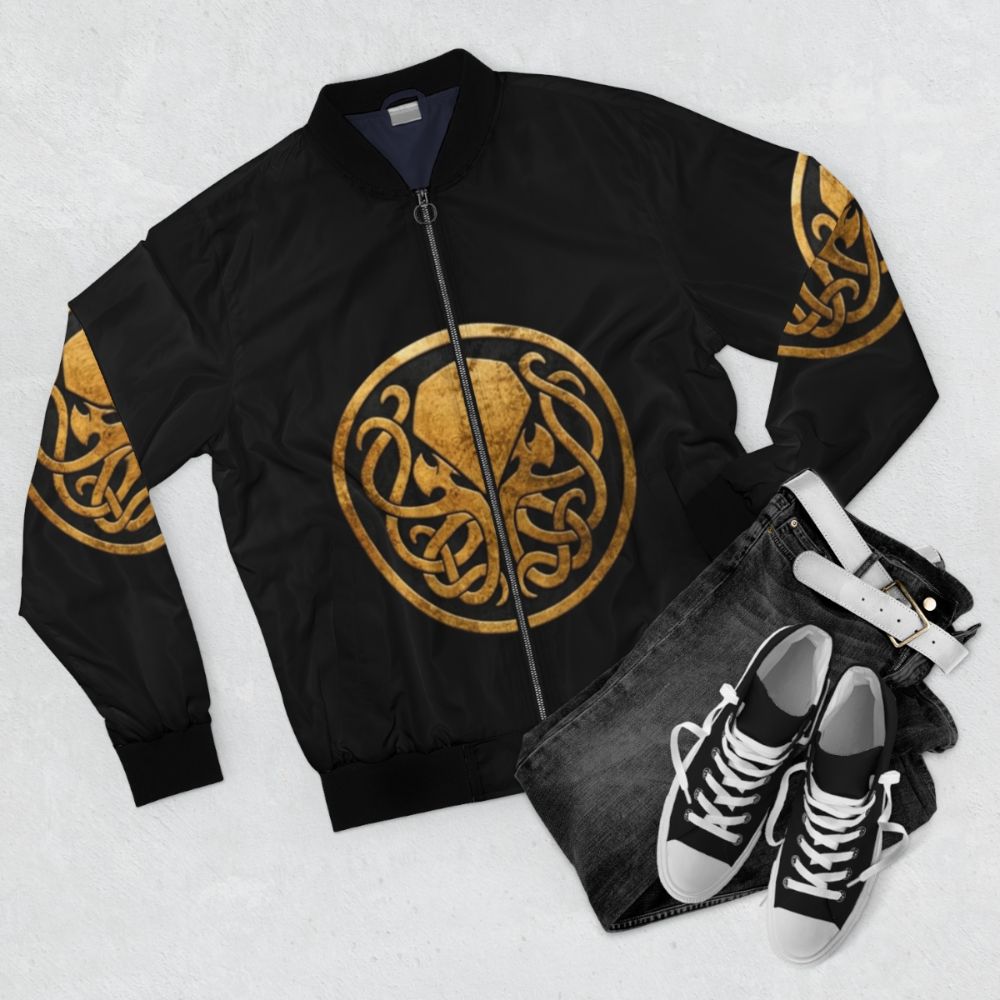 Cthulhu-inspired bomber jacket with H.P. Lovecraft's cosmic horror design - Flat lay