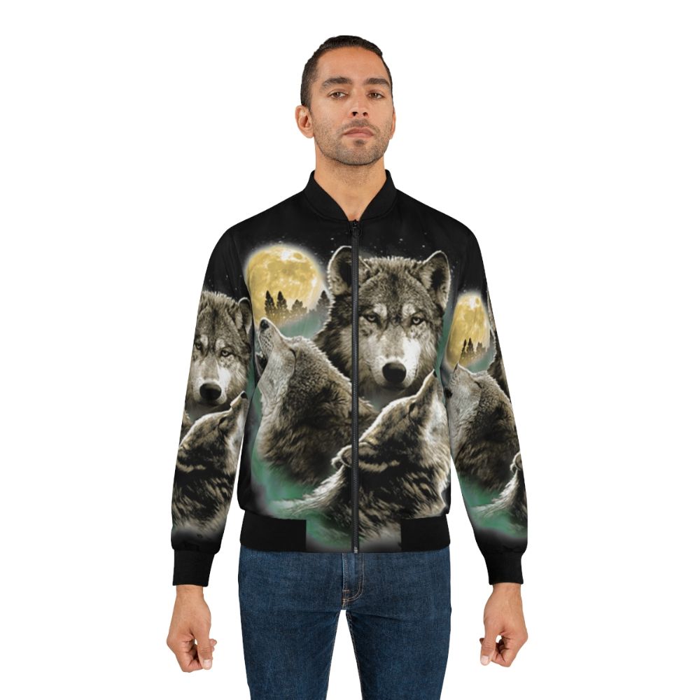 A bomber jacket featuring a design of three wolves howling at the full moon in a natural, wilderness setting. - Lifestyle