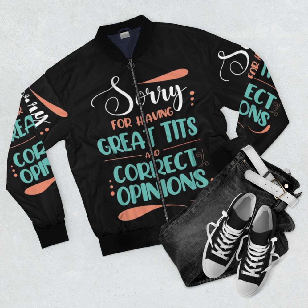 Bomber jacket with the quote "Sorry for Having Great Tits and Correct Opinions" - Flat lay