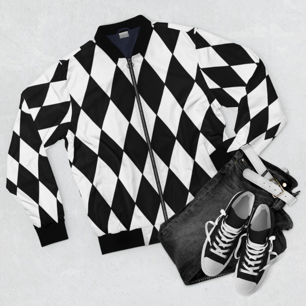 Black and white bomber jacket with a harlequin diamond pattern design - Flat lay