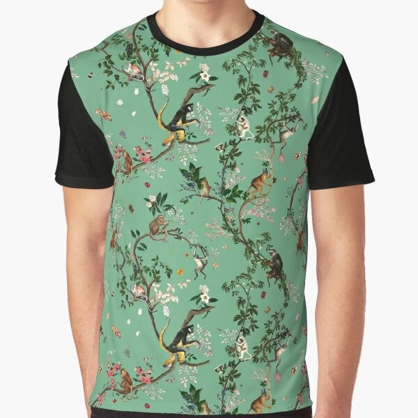 A vibrant green t-shirt featuring a playful monkey design amidst a lush, tropical floral pattern.