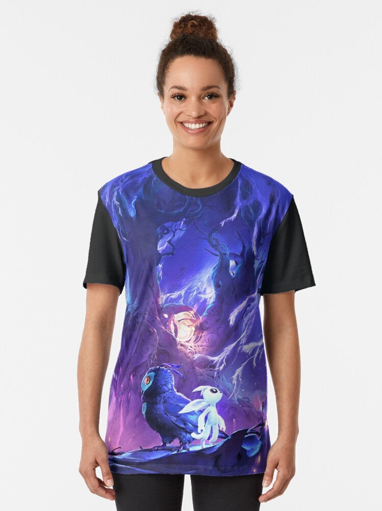 Ori, the main character from the video game Ori and the Will of the Wisps, featured on a white graphic t-shirt. - Women