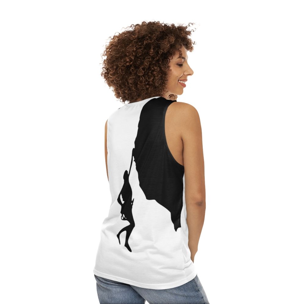 Man climbing rock wall wearing Climb Cliffhanger Unisex Tank Top - women back